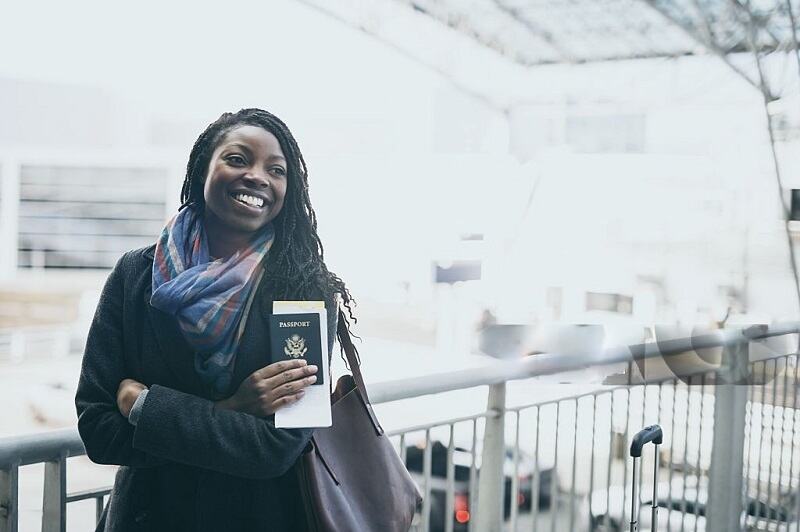 lady holding a passport